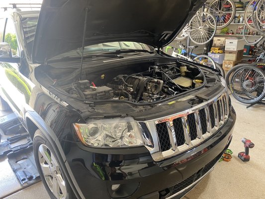 Radiator replacement - 2013 Jeep Grand Cherokee- leaking radiator assembly. Replaced the radiator assembly, and bled the cooling system. System back to normal operation. Radiator replacement - 2013 Jeep Grand Cherokee- leaking radiator assembly. Replaced the radiator assembly, and bled the cooling system. System back to normal operation.