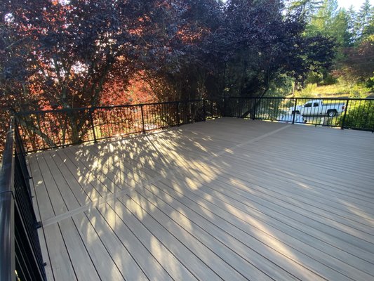 Kent Deck + Railing - Huge AZEK Vintage English Walnut deck with a Peak Aluminum Railing. Perfect for entertaining all summer with over 600 square feet of outdoor living space.