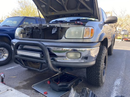 2002 Toyota Tundra Radiator leaking - Customer originally complained of some fluid leaking. They had originally thought it was power steering fluid. With the consistency in color being the same. Inspected the vehicle and found the top tank was split. Replaced radiator assembly and coolant. Vehicle is back on the road thanks to our technician Jason. 2002 Toyota Tundra Radiator leaking - Customer originally complained of some fluid leaking. They had originally thought it was power steering fluid. With the consistency in color being the same. Inspected the vehicle and found the top tank was split. Replaced radiator assembly and coolant. Vehicle is back on the road thanks to our technician Jason.