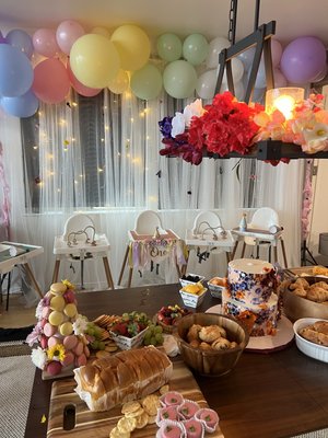 First birthday party with high chair rentals - This birthday party featured high chair rentals for the birthday girl and her baby crew. A basic backdrop and food sourcing package.