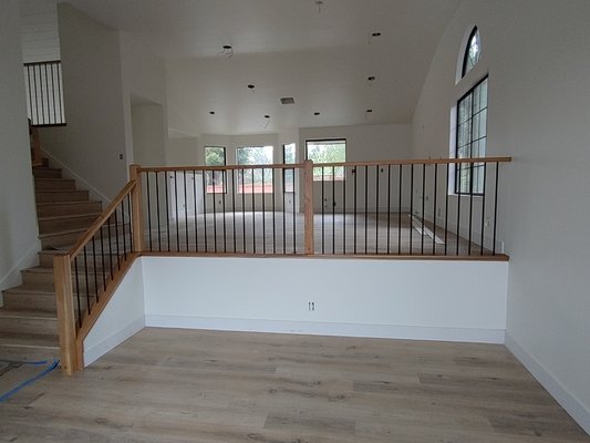 White Oak and black shoeless balusters - This otherwise sterile room is brightened with warm wood tones and a simple clean railing design. White Oak and black shoeless balusters - This otherwise sterile room is brightened with warm wood tones and a simple clean railing design.