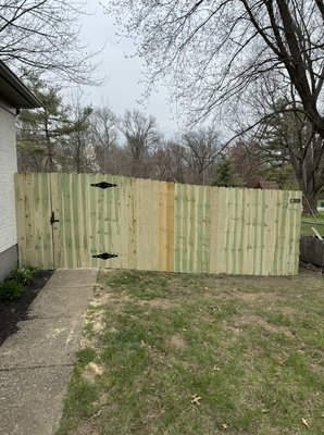 Front Privacy and Gate Sections Replaced - This Privacy fence replacement consisted of just replacing the front section that contained two gates. The right side had a 30in walk gate that was falling apart along with a broken gate post. Replaced all sections and installed a 36in gate for the customer. The left side had a 10ft gate that would hardly open. Customer asked if we could do a 8ft drive double gate and that is what we did for them. Customer was excellent to work with. Glad we could help make them happy about their fence. Front Privacy and Gate Sections Replaced - This Privacy fence replacement consisted of just replacing the front section that contained two gates. The right side had a 30in walk gate that was falling apart along with a broken gate post. Replaced all sections and installed a 36in gate for the customer. The left side had a 10ft gate that would hardly open. Customer asked if we could do a 8ft drive double gate and that is what we did for them. Customer was excellent to work with. Glad we could help make them happy about their fence.