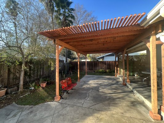 Redwood Pergola - We rebuilt an old aging arbor, and created a custom design pergola for additional shade and long life using all con heart redwood. Redwood Pergola - We rebuilt an old aging arbor, and created a custom design pergola for additional shade and long life using all con heart redwood.