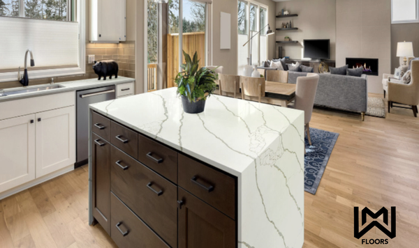 Engineered Quartz Stone - New Calacatta Lazo Gold is a gorgeous quartz surface that elevates the look of any interior room. this color features a bright white background with a mix of bold and soft brown veining with gold tones around the perimeter, offering the look of luxurious marble. New Calacatta Lazo Gold is durable, never needs sealing, and stands up against scratches, stains, and chips, making it the ideal solution for residential and commercial applications. Always on-trend, use this quartz to create enviable countertops, kitchen backsplashes, accent walls, shower surrounds, and more.