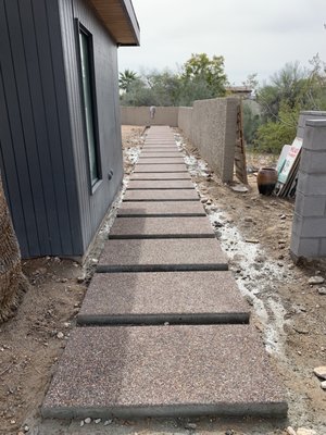 Exposed Aggregate Concrete That Elevates Spaces - We install exposed aggregate concrete surfaces that blend durability with natural beauty. By revealing textured stone finishes, we create slip-resistant, long-lasting patios, driveways, and walkways. Ideal for residential and commercial spaces seeking style and strength. Exposed Aggregate Concrete That Elevates Spaces - We install exposed aggregate concrete surfaces that blend durability with natural beauty. By revealing textured stone finishes, we create slip-resistant, long-lasting patios, driveways, and walkways. Ideal for residential and commercial spaces seeking style and strength.