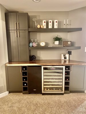 Kitchen remodel - This remodel was done on a kitchen that was dated and did not function for a family of 5. The family needed the refrigerator tucked away and I wanted to utilize the space under the staircase. The answer was both and to add two separate islands - one for meal prep and the other for seating up to 10 people. The homeowners are beyond thrilled with their new kitchen?!!