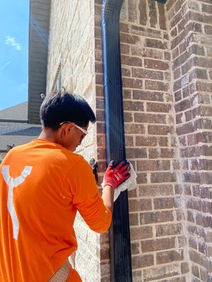 5" K-Style Gutter Replacement In Bentonville AR - this project consisted of replacing black 5-in seamless rain gutters that had been affected by storm damage in Bentonville, Arkansas. 

we removed the old rain gutters and installed new gutters and downspouts