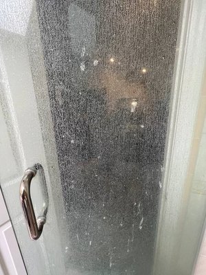Master bathroom glass door restoration - A deep cleaning was carried out on the entire shower area and a restoration on the bathroom doors as a result of the daily accumulation of calcium and salts due to daily use. Master bathroom glass door restoration - A deep cleaning was carried out on the entire shower area and a restoration on the bathroom doors as a result of the daily accumulation of calcium and salts due to daily use.