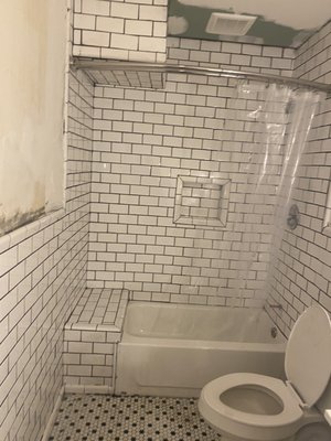Bathroom tub to shower conversion - This project was a bathtub to shower conversion in a one bathroom condo. We used 4 x 12 inch subway tiles and Delta Shower Trim.