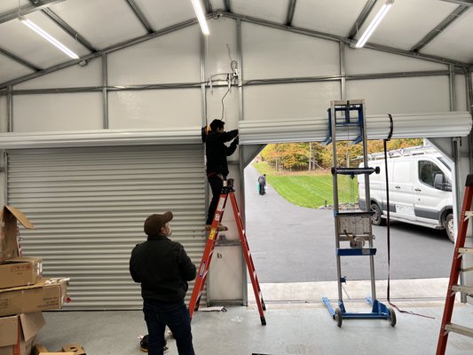 Commercial opener installation - Rolling sheet door installation Commercial opener installation - Rolling sheet door installation