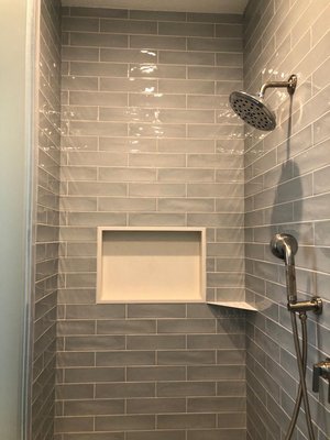 Master Bathroom Remodel - This master bathroom remodel involved in major relocations in order to open up the space and utilize the space more efficiently. We relocated the tub and the vanity and changed the foot print of the shower.
