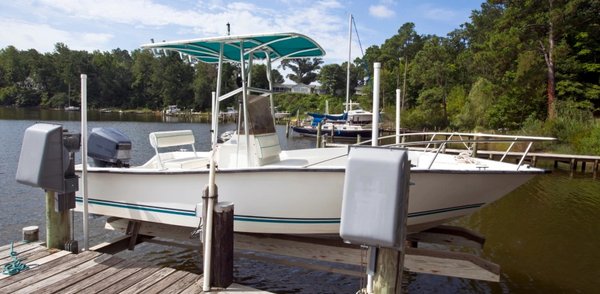 Boat Lift Installation - Our boat lift installation services include a variety of options such as jet ski lifts, boat lift construction, and comprehensive installations by skilled boat lift installers. Each project is approached with precision, ensuring that your boat lift not only meets but exceeds the functional requirements necessary for your watercraft. Whether you need a simple jet ski lift or a complex boat lift setup, our team is equipped to provide a solution that ensures ease of use and long-term reliability. Our installers are known for their meticulous attention to detail, which guarantees that every boat lift we install provides maximum protection and accessibility for your boat. With us, choosing the right boat lift service means investing in the longevity and safety of your watercraft.