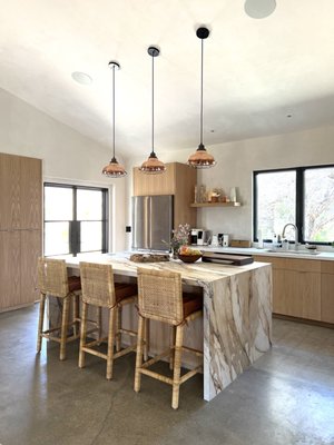Joshua Tree Retreat | Desert Home Renovation Joshua Tree Retreat | Desert Home Renovation - A complete transformation of a Joshua Tree home, designed to reflect the beauty and simplicity of its desert setting. The R Creative created a warm, contemporary interior using natural materials, earthy tones and tactile textures throughout.

The project included the selection of finishes, lighting, furniture, rugs, art and accessories, with each element chosen to create a relaxed but considered desert retreat. Vintage and contemporary pieces were layered together to give the home character and a sense of place, while maintaining a clean, cohesive aesthetic.

The result is an inviting, highly individual home that feels connected to the surrounding landscape rather than simply decorated in a “desert” style.