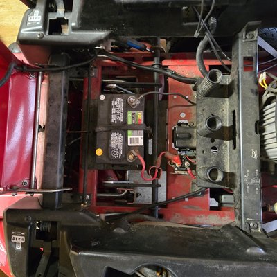 Toro/selenoid repair - This piece of equipment is a Toro customer stated equipment was making a clicking sound when attempting to crank the engine. The tech diagnosis determined the problem was a faulty solenoid switch which regulates the amount of current going to the starter from the battery.