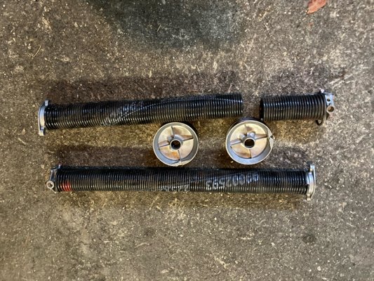 Garage Door Spring And Damaged Drums Replacement - Whether you just discovered that a spring broke and you need to replace it, or your door is unbalanced and some adjustments are required, wait. Don't rush into trying the DIY approach when it comes to garage door springs. These springs can be very dangerous to handle, and professional training is usually required to deal with problems regarding them.
We will fix your broken garage door spring the same day you call! Garage Door Spring And Damaged Drums Replacement - Whether you just discovered that a spring broke and you need to replace it, or your door is unbalanced and some adjustments are required, wait. Don't rush into trying the DIY approach when it comes to garage door springs. These springs can be very dangerous to handle, and professional training is usually required to deal with problems regarding them.
We will fix your broken garage door spring the same day you call!