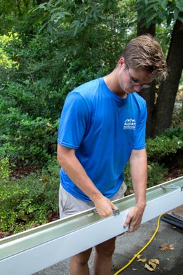 Whole House Seamless Gutters and Lifetime Gutter Protection Installed - The installation process of seamless gutters involves several steps but begins with an assessment of your property's specific needs. Here's a breakdown of the typical installation process and the benefits of seamless gutters, along with lifetime gutter protection:
Assessment and Measurement: A professional gutter installer will visit your property to assess the layout, dimensions, and drainage requirements. They'll take precise measurements to ensure the seamless gutters are custom-fit to your home.
Material Selection: You'll have the opportunity to choose the material for your seamless gutters. Common options include aluminum, copper, and steel, each offering different levels of durability, aesthetics, and cost.
Fabrication: Unlike traditional sectional gutters, seamless gutters are custom-made on-site using a specialized gutter machine. This machine shapes the gutter material into seamless lengths that match the measurements of your home.
Installation: The installer will attach the seamless gutters to your home's fascia board using hangers or brackets. They'll ensure proper slope and alignment to facilitate efficient water flow towards the downspouts.
Sealing and Reinforcement: Seams in traditional gutters are vulnerable to leaks over time. Seamless gutters, however, are inherently leak-resistant. Additionally, the installer may use sealant at joints and reinforce critical points to enhance durability.
Downspout Installation: Downspouts are essential for directing water away from your home's foundation. The installer will strategically place downspouts and connect them to the seamless gutter system to ensure effective drainage.
Testing and Cleanup: Once the installation is complete, the installer will test the gutter system to ensure proper flow and drainage. Any debris or construction waste will be removed from the site, leaving your property clean and tidy.
Now, let's discuss the benefits of seamless gutters and lifetime gutter protection:
Leak Resistance: Seamless gutters have fewer joints, minimizing the risk of leaks and water damage to your home's foundation, walls, and landscaping.
Custom Fit: Seamless gutters are tailored to the exact measurements of your home, ensuring a perfect fit and maximum efficiency in water drainage.
Durability: Made from high-quality materials such as aluminum or steel, seamless gutters are built to withstand harsh weather conditions, including heavy rain, snow, and ice.
Low Maintenance: With fewer seams and joints, seamless gutters require less maintenance compared to traditional gutters. This means fewer chances of clogs and blockages, reducing the need for regular cleaning.
Aesthetic Appeal: Seamless gutters offer a clean, streamlined look that enhances the curb appeal of your home. They come in a variety of colors and finishes to complement your property's exterior design.
Lifetime Gutter Protection: Investing in gutter protection systems, such as gutter guards or leaf screens, further enhances the benefits of seamless gutters. These systems prevent debris buildup, reducing the need for cleaning and extending the lifespan of your gutter system.
In summary, seamless gutters offer a superior solution for effective water management, durability, and aesthetic appeal. When combined with lifetime gutter protection, they provide long-term benefits and peace of mind, protecting your home from water damage while minimizing maintenance requirements. Whole House Seamless Gutters and Lifetime Gutter Protection Installed - The installation process of seamless gutters involves several steps but begins with an assessment of your property's specific needs. Here's a breakdown of the typical installation process and the benefits of seamless gutters, along with lifetime gutter protection:
Assessment and Measurement: A professional gutter installer will visit your property to assess the layout, dimensions, and drainage requirements. They'll take precise measurements to ensure the seamless gutters are custom-fit to your home.
Material Selection: You'll have the opportunity to choose the material for your seamless gutters. Common options include aluminum, copper, and steel, each offering different levels of durability, aesthetics, and cost.
Fabrication: Unlike traditional sectional gutters, seamless gutters are custom-made on-site using a specialized gutter machine. This machine shapes the gutter material into seamless lengths that match the measurements of your home.
Installation: The installer will attach the seamless gutters to your home's fascia board using hangers or brackets. They'll ensure proper slope and alignment to facilitate efficient water flow towards the downspouts.
Sealing and Reinforcement: Seams in traditional gutters are vulnerable to leaks over time. Seamless gutters, however, are inherently leak-resistant. Additionally, the installer may use sealant at joints and reinforce critical points to enhance durability.
Downspout Installation: Downspouts are essential for directing water away from your home's foundation. The installer will strategically place downspouts and connect them to the seamless gutter system to ensure effective drainage.
Testing and Cleanup: Once the installation is complete, the installer will test the gutter system to ensure proper flow and drainage. Any debris or construction waste will be removed from the site, leaving your property clean and tidy.
Now, let's discuss the benefits of seamless gutters and lifetime gutter protection:
Leak Resistance: Seamless gutters have fewer joints, minimizing the risk of leaks and water damage to your home's foundation, walls, and landscaping.
Custom Fit: Seamless gutters are tailored to the exact measurements of your home, ensuring a perfect fit and maximum efficiency in water drainage.
Durability: Made from high-quality materials such as aluminum or steel, seamless gutters are built to withstand harsh weather conditions, including heavy rain, snow, and ice.
Low Maintenance: With fewer seams and joints, seamless gutters require less maintenance compared to traditional gutters. This means fewer chances of clogs and blockages, reducing the need for regular cleaning.
Aesthetic Appeal: Seamless gutters offer a clean, streamlined look that enhances the curb appeal of your home. They come in a variety of colors and finishes to complement your property's exterior design.
Lifetime Gutter Protection: Investing in gutter protection systems, such as gutter guards or leaf screens, further enhances the benefits of seamless gutters. These systems prevent debris buildup, reducing the need for cleaning and extending the lifespan of your gutter system.
In summary, seamless gutters offer a superior solution for effective water management, durability, and aesthetic appeal. When combined with lifetime gutter protection, they provide long-term benefits and peace of mind, protecting your home from water damage while minimizing maintenance requirements.