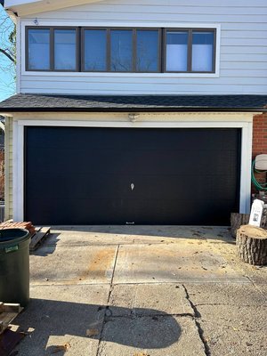 Garage Door 15x7 - 15x7 insulated, single track, extension, black, contemporary, lock. Garage Door 15x7 - 15x7 insulated, single track, extension, black, contemporary, lock.