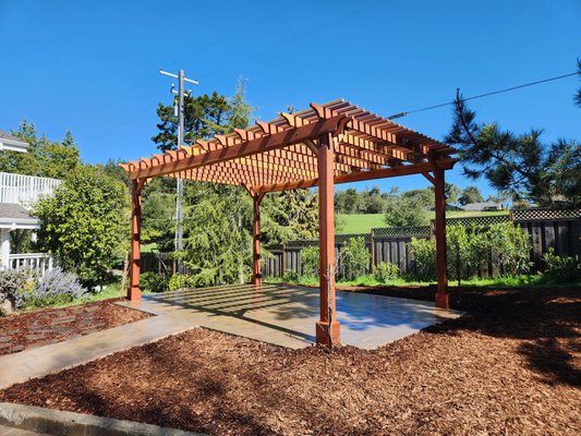 Backyard Landscape Design and Build Featuring a Custom Pergola - This backyard remodel features a modern shaded patio made with pavers, creating a relaxing spot to enjoy the outdoors. Completed in Los Gatos, CA (95033). Backyard Landscape Design and Build Featuring a Custom Pergola - This backyard remodel features a modern shaded patio made with pavers, creating a relaxing spot to enjoy the outdoors. Completed in Los Gatos, CA (95033).