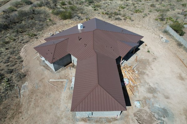 Standing Seam Metal Project - This was a home built in 2022. Our team installed ice & water shield in the valleys and premium SAP Metal Roofing Underlayment atop the fresh decking before installing a tailor-cut Standing Seam Metal Roofing System by ASC Metals. Standing Seam Metal Project - This was a home built in 2022. Our team installed ice & water shield in the valleys and premium SAP Metal Roofing Underlayment atop the fresh decking before installing a tailor-cut Standing Seam Metal Roofing System by ASC Metals.