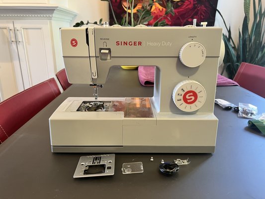Singer Heavy Duty 4411 - This service was done as a donation to Noisebridge, a local free makerspace. This machine wasn't working at all. We removed significant grease buildup in the lower cavity, found and removed a small piece of felt glued to the bobbin case, adjusted the bottom tension, and sanded burrs from the needle plate to avoid future thread snags. Sewing beautifully again! Singer Heavy Duty 4411 - This service was done as a donation to Noisebridge, a local free makerspace. This machine wasn't working at all. We removed significant grease buildup in the lower cavity, found and removed a small piece of felt glued to the bobbin case, adjusted the bottom tension, and sanded burrs from the needle plate to avoid future thread snags. Sewing beautifully again!