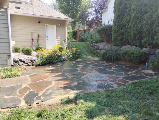 Flagstone project one day completed - Brought in gravel and flagstone and created an outdoor bbq place for the customer