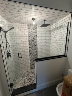Bath & Fireplace Installation - Basement Project, Floor tile 12x24 Bathroom and Fireplace More photos to come.