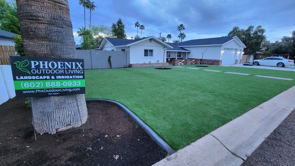 Front Yard Remodel to Artificial Turf, Concrete Steps, Planting, and Low Voltage Lighting - We updated this front yard from a large grass area to artificial turf (80 oz AZ Blend) and Concrete Steps from the street to the entry way. We added some pillars for a new planting area by the front, ran a new 1/2" Schedule 40 PVC irrigation zone, and added a couple Red Push Pistache Trees and Green Hopseed to grow into a privacy hedge along the side. Front Yard Remodel to Artificial Turf, Concrete Steps, Planting, and Low Voltage Lighting - We updated this front yard from a large grass area to artificial turf (80 oz AZ Blend) and Concrete Steps from the street to the entry way. We added some pillars for a new planting area by the front, ran a new 1/2" Schedule 40 PVC irrigation zone, and added a couple Red Push Pistache Trees and Green Hopseed to grow into a privacy hedge along the side.