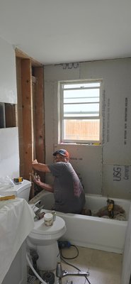 Mold Remediation - Brand New Bathroom - bathroom at 7 in of water some mold had to dry out take out the whole tub and toilet put tub new tile new walls new toilet customer extremely happy.