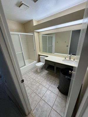 Bathroom and shower remodel Oxnard, Ca - This bathroom remodel transformed a space that was in poor condition—old, outdated, and difficult to maintain. The original shower, with its builder-grade 4" x 4" tile, was especially hard to clean, and the fixtures, vanity, and flooring had all seen better days.

The finished result is a fresh, modern space. We installed new tile flooring, a sleek vanity top with an updated sink, and a luxurious soaking tub surrounded by large-format porcelain tile. A spacious 28-inch niche now provides ample room for shampoos and conditioners.

Our client was thrilled with the dramatic transformation and has since referred us to many others.