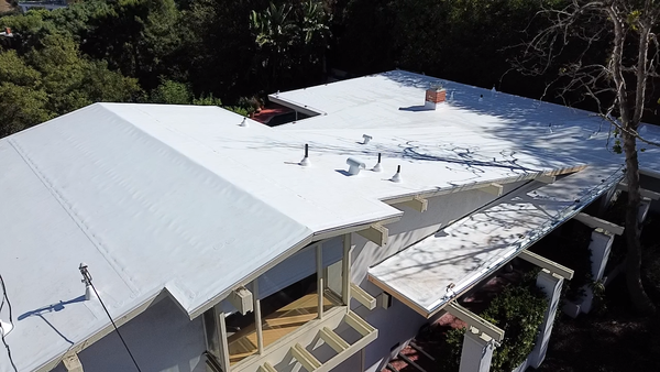 Mulholland TPO Install - We tore of the existing foam roof and replaced it with 60 mil TPO. 36 squares. Mulholland TPO Install - We tore of the existing foam roof and replaced it with 60 mil TPO. 36 squares.