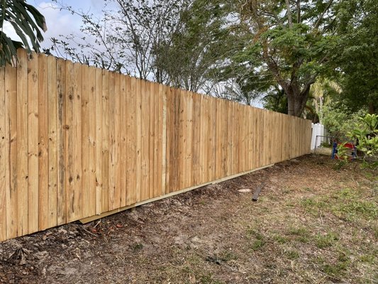 6’ tall stockade style privacy fence with 4” pickets. - Here is our custom built 6’ tall stockade style privacy fence with 4” wide pickets. This project was a doozy! There aren’t many photos from the inside of this fence because of the limited access into the back yard, between loads of shrubbery and many pieces of planter decors we just couldn’t get any photos that you could see the fence well. Beautiful none the less from both sides!