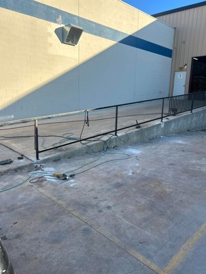 Ferguson loading dock handrail - Re constructed loading dock handrail that was damaged by trash truck Ferguson loading dock handrail - Re constructed loading dock handrail that was damaged by trash truck