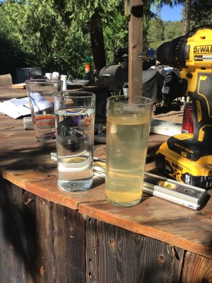 Water purification and filtration system installation - Problem: Cloudy Water
Solution: Kinetico of Placerville installed a Kinetico S350XP Water Softener which is a light commercial non-electric softener built to handle heavy hardness and iron removal. This system includes a dual tank for clean water backwash.
The photo shows her water before and after the system. The system removed the cloudy water which was caused by hardness and iron. Water purification and filtration system installation - Problem: Cloudy Water
Solution: Kinetico of Placerville installed a Kinetico S350XP Water Softener which is a light commercial non-electric softener built to handle heavy hardness and iron removal. This system includes a dual tank for clean water backwash.
The photo shows her water before and after the system. The system removed the cloudy water which was caused by hardness and iron.