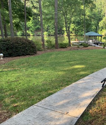Zoysia Sod - This project was a complete back yard renovation on Jackson lake in Monticello. We prepped the yard by getting it down to bare, loose dirt, and then installed Zeon zoysia sod. The area was approximately 3000 sq ft. Zoysia Sod - This project was a complete back yard renovation on Jackson lake in Monticello. We prepped the yard by getting it down to bare, loose dirt, and then installed Zeon zoysia sod. The area was approximately 3000 sq ft.