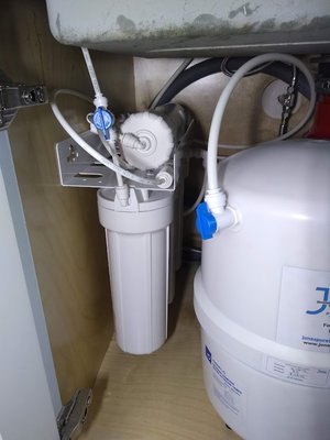 Reverse Osmosis drinking water system installation - Installed our custom-built RO system including drilling a countertop hole for the new brushed nickel faucet. The happy customer was so relieved to be done lugging heavy water jugs and the ugly water cooler taking up kitchen space. And with our drinking water system rental program they paid minimal upfront costs and cut their monthly drinking water bill by over 75%!! Reverse Osmosis drinking water system installation - Installed our custom-built RO system including drilling a countertop hole for the new brushed nickel faucet. The happy customer was so relieved to be done lugging heavy water jugs and the ugly water cooler taking up kitchen space. And with our drinking water system rental program they paid minimal upfront costs and cut their monthly drinking water bill by over 75%!!