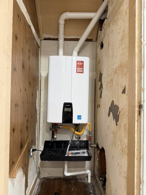 Navien Water Hearer Install. - We got a call from a new customer to inspect some else’s (unlicensed) tankless water heater install and found multiple code and safety violations with the outdoor that was
installed in this Kitchen pantry. We immediately diverted additional plumbing technicians out to the site to assist in changing this over to the correct tankless water heater. We were done that same day and they had safe hot water in their home. Navien Water Hearer Install. - We got a call from a new customer to inspect some else’s (unlicensed) tankless water heater install and found multiple code and safety violations with the outdoor that was
installed in this Kitchen pantry. We immediately diverted additional plumbing technicians out to the site to assist in changing this over to the correct tankless water heater. We were done that same day and they had safe hot water in their home.