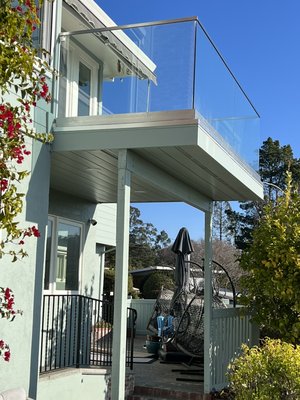 Exterior remodel - Owner wanted to update the exterior of her home. We redid her balcony and installed glass railings. Installed new siding and stucco. Exterior remodel - Owner wanted to update the exterior of her home. We redid her balcony and installed glass railings. Installed new siding and stucco.