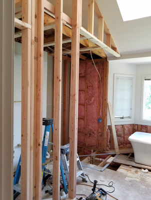 Second floor, master bathroom remodel in Ballwin, Mo. - Remodeling an existing home's bathroom on the 2nd floor requires knowledge of building practices, plumbing, and experience. The bathroom was 25 years old and had been poorly planned. The client hated the toilet that faced the tiny shower (an afterthought thrown in while it was being built. the separate vanities wasted space, and the 2-step tub in the bay window's jets were broken. The client longed for marble floors, a large shower, and a soaking tub. A bathroom that she and her husband could use at the same time without bumping into each other. To create the large shower, we moved the heat vent forward and pulled the shower into the bay window, The center water column and glass corners allow you to see the beautiful tile work. You don't realize that the shower is bumped out into the bay window. The toilet was relocated and given a half wall for privacy. Romantic window shades that feature an easy lift mechanism and a sleek new soaking tub. His and her vanities are connected and share a simple beveled, arched mirror. The top of counter vanities has outlets inside to eliminate clutter from cords. The client now soaks in the lap of luxury right in her own home! Second floor, master bathroom remodel in Ballwin, Mo. - Remodeling an existing home's bathroom on the 2nd floor requires knowledge of building practices, plumbing, and experience. The bathroom was 25 years old and had been poorly planned. The client hated the toilet that faced the tiny shower (an afterthought thrown in while it was being built. the separate vanities wasted space, and the 2-step tub in the bay window's jets were broken. The client longed for marble floors, a large shower, and a soaking tub. A bathroom that she and her husband could use at the same time without bumping into each other. To create the large shower, we moved the heat vent forward and pulled the shower into the bay window, The center water column and glass corners allow you to see the beautiful tile work. You don't realize that the shower is bumped out into the bay window. The toilet was relocated and given a half wall for privacy. Romantic window shades that feature an easy lift mechanism and a sleek new soaking tub. His and her vanities are connected and share a simple beveled, arched mirror. The top of counter vanities has outlets inside to eliminate clutter from cords. The client now soaks in the lap of luxury right in her own home!