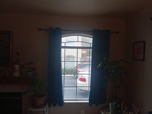 Installed new curtain rod and shelves. - Installed new curtain rods and shelves.