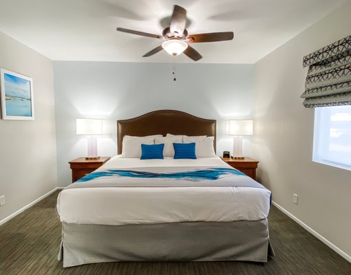 Havasu Dunes - Hospitality Remodel - We brightened up the guest rooms at the Havasu Dunes in Lake Havasu City, Arizona for this soft remodel project. Shades of aqua were added to bring a touch of the lake indoors. New window coverings, paint, lighting, artwork, pillows and bedding turned these once dark and heavy suites into a light and airy lake getaway. Havasu Dunes - Hospitality Remodel - We brightened up the guest rooms at the Havasu Dunes in Lake Havasu City, Arizona for this soft remodel project. Shades of aqua were added to bring a touch of the lake indoors. New window coverings, paint, lighting, artwork, pillows and bedding turned these once dark and heavy suites into a light and airy lake getaway.