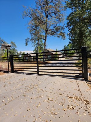 Nick Automatic Gate Project - We fabricated two custom gates, one was automatic. They were both powdercoated with a semi gloss finish. The gates completmented a custom fence project we had installed in 2022. Nick Automatic Gate Project - We fabricated two custom gates, one was automatic. They were both powdercoated with a semi gloss finish. The gates completmented a custom fence project we had installed in 2022.