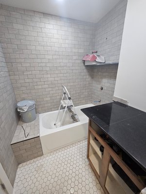 Bathroom remodel Sandy, Utah - We added this full bathroom to the home.  We do this tile work and natural stone fabrication in house.  Call us for a free estimate! 801-895-0672