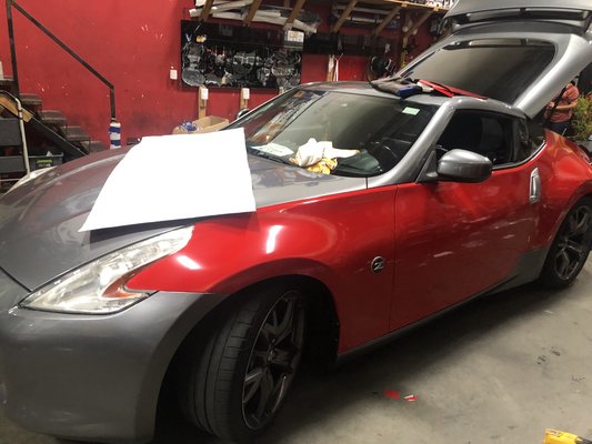 Vinyl wrap for a Nissan 370Z - Vinyl Wrap was done for a Nissan 370z with Cheetah Wrap. Color displayed is Glossy Red. Vinyl wrap for a Nissan 370Z - Vinyl Wrap was done for a Nissan 370z with Cheetah Wrap. Color displayed is Glossy Red.