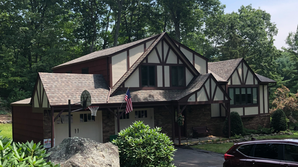 New roof and gutter guards - Roof replacement, gutter repair and gutter guards installed at this Ringwood, NJ home.