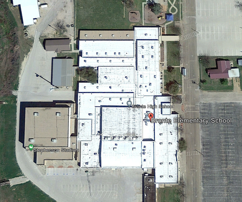 Miles of Gas Lines and 60 Roof Drains - We completed installing miles of new gas lines and 60 roof drains at Bronte Elementary School just in time for school to resume. Our work guaranteed no roof collapses because of heavy rains and provided heat to the students in the winter.