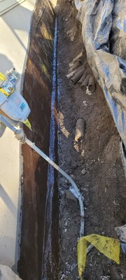 Exterior foundation seal. - Water was coming through the foundation wall. we excavated and cleaned the foundation, removing all impurities. we patched the spreaders and voids with hydraulic cement. we then hand brushed below grade emulsion and fiberglass mesh. once the first two hardened, we brushed on another coat of emulsion and sealed a 6mill vapor barrier to the foundation. Th footing drains were being backfield by machine, so we installed Delta panels over the more than good 4-step seal. Exterior foundation seal. - Water was coming through the foundation wall. we excavated and cleaned the foundation, removing all impurities. we patched the spreaders and voids with hydraulic cement. we then hand brushed below grade emulsion and fiberglass mesh. once the first two hardened, we brushed on another coat of emulsion and sealed a 6mill vapor barrier to the foundation. Th footing drains were being backfield by machine, so we installed Delta panels over the more than good 4-step seal.