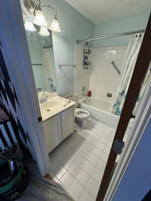 Bathroom remodel - This remodel was a partial bathroom remodel. New tile floor, toilet, vanity and paint. Bathroom remodel - This remodel was a partial bathroom remodel. New tile floor, toilet, vanity and paint.