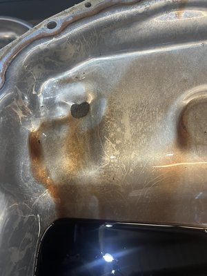 Transmission inspection - This 2020 GMC Sierra has concerns of transmission shuddering. Inspection of the fluid pan revealed clutch disc debris from failed components. Transmission inspection - This 2020 GMC Sierra has concerns of transmission shuddering. Inspection of the fluid pan revealed clutch disc debris from failed components.