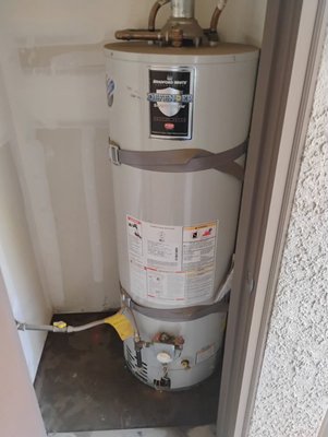 Water Heater Replacement - Customer had an older water heater that was leaking. We replaced the water heater and properly strapped it to the wall.