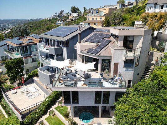 Laguna Beach Residential Solar Installation - Panasonic residential solar panel installation done on Laguna Beach home! Not pictured is a Tesla 7.6kw inverter. Installation came out beautifully! Contact OC Solar today for a free quote! Laguna Beach Residential Solar Installation - Panasonic residential solar panel installation done on Laguna Beach home! Not pictured is a Tesla 7.6kw inverter. Installation came out beautifully! Contact OC Solar today for a free quote!